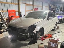 Right before the initial tear down, where we removed the mismatched hood for easy access LOL