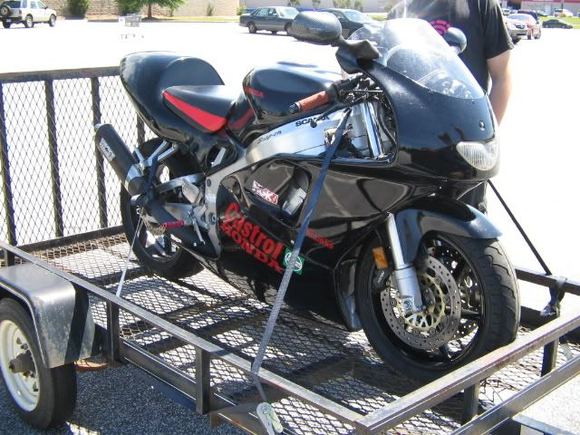 when i first got her. she had an airtech nsr gp rep kit on it, v&amp;h slip on, and lots of stickers lol