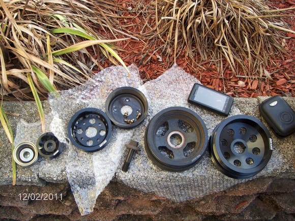 Stock pulleys next to AMS pulleys.