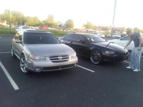 my 02 maxima with my freinds 645 after a car wash.