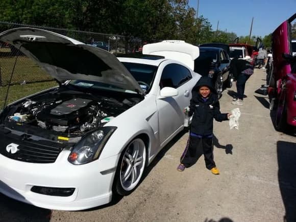 My LiL man cleaning his car before judges arrive