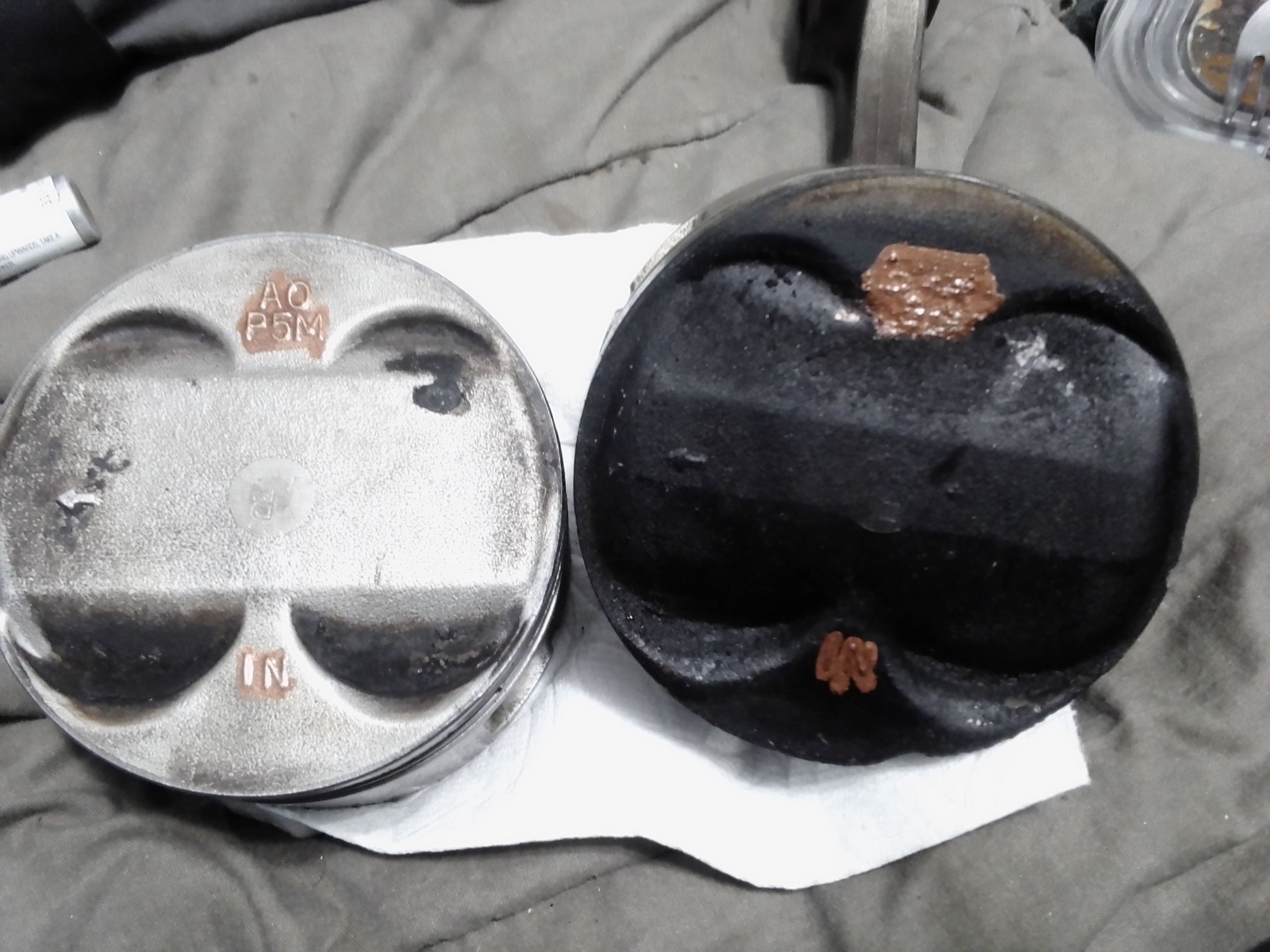 Piston tops stamped P5M and P13 different shaped domes as well as height