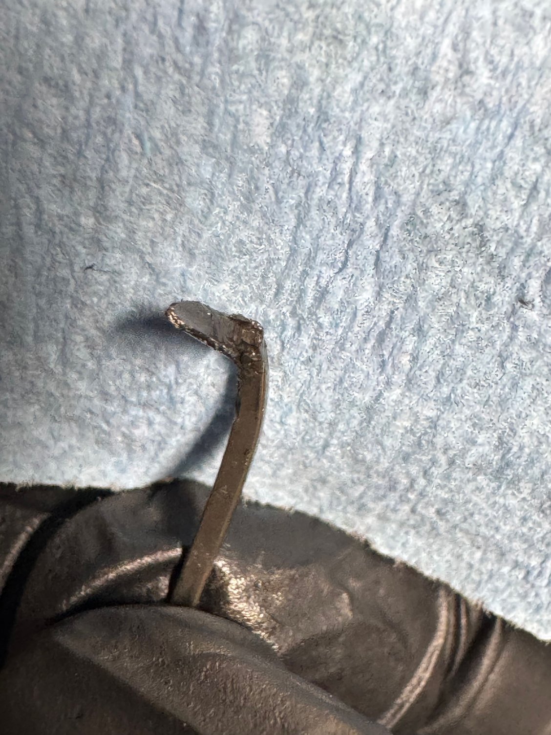 Part of the pin that ran though a gearset