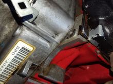 Leaking oil from the corner just above the engine stamp. It isnt the vtec solenoid or dizzy O ring.