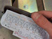 Here I am printing out a quick paper copy of the PCB design and doing a "sanity check" to make sure the design will work (just tracing the circuit by hand and making sure there are no mistakes)