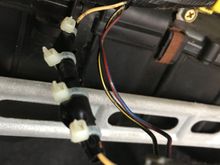 I put a 18-22 gauge connector and crimped it, then electric taped and zip tied it back to stock.