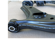 the bracket that came with the traction bar matches to the LCA on the left
my car has the pillow ball LCA on the right
