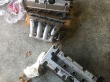 After that I plucked some injectors from my old legend and picked up a throttle body from a type s. The block on the top is going in the car. The one on the bottom was for parts. May slap it together and do a k20/k24