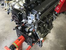 Some of my brackets came in from powder coating so I tossed them on the motor. I finally found a obd1 GSR oem shell in my box of 100 distributors. Polished that bad boy up then put it on the motor.