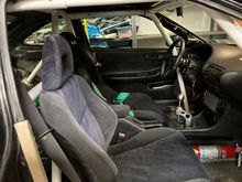 Interior, bolt-in cage, Bride racing seat and K-tuned shifter with Personal wheel. 