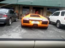 some italian car i think its a lambo. it was at an antiques store. people were pissed i was driving so slow