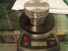 Wiseco pistons. 85mm bore.2cc dome.Partial skirt, flat top design. .993&quot; compression height. A nice lightweight piston.This will yield about 12:1 compression with the head I plan on using...