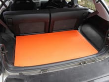 Rear interior w/orange mat, which keeps stuff from sliding around.
