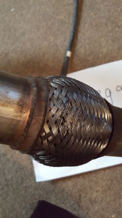 Downpipe flex joint damage. Does not leak.