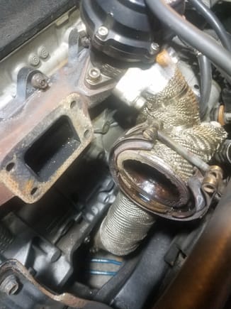 This is what you get when you rebuild a turbo but DON'T get it properly balanced. I'd say not even 10k miles and the bearings and seals were shot due to the excessive vibrations. And I'm sure the manifold, and back-pressure created by the recirc'd dumptube, didn't help matters AT ALL.