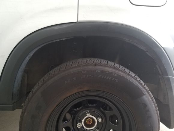With coil spring booster