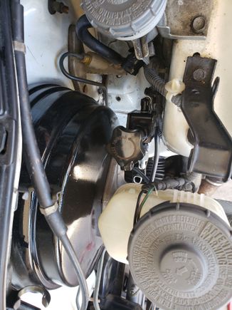 Its a chase bays brake line tuck kit, heres the proportioning valve that sits on the drivers side of the master cylinder so its hidden behind the strut tower. You also have to flip the brake booster around so the vacuum line is on the passenger side otherwise that nipple hits the proportioning valve. 