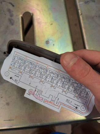 Here I am printing out a quick paper copy of the PCB design and doing a "sanity check" to make sure the design will work (just tracing the circuit by hand and making sure there are no mistakes)