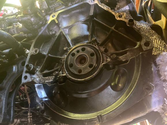 The rubber ring, it's rear main seal? It's leaking? I did my oil pan gasket twice before, only used sealant on corners so I think it's this seal leaking?