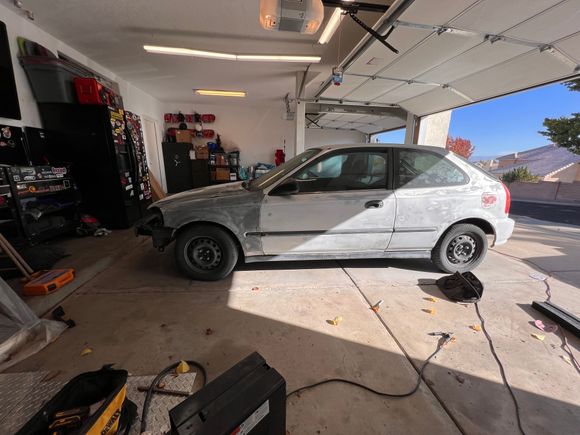 Sanding. Note from future self to that idiot, 50* weather makes for shit paint. Also, you’re going to regret not spending more time on the body work and prep. You went too beater bud…