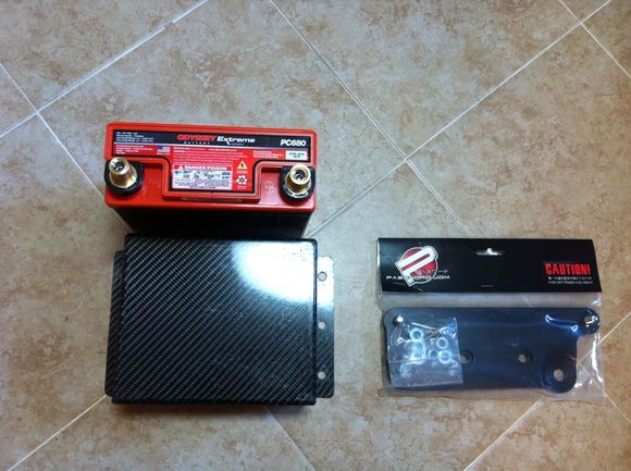 Odyssey Extreme PC680 and PWJDM Battery relocation kit. EF kits come with carbon fiber cover.