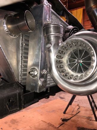 This turbo is about an inch shorter side to side. Witch unfortunately made it impossible to keep my backdoor intercooler setup on the hot side. 