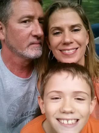 I guess I haven't shared many pic of the family....thats me, the old gray one, the hot wife and my youngest son. Just us three left at home now.