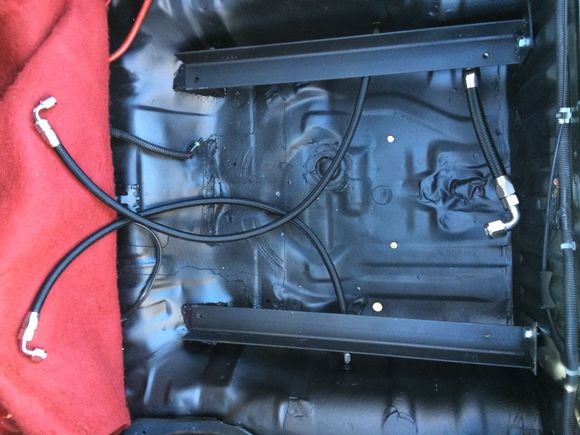 Return line on the left, vent line on the right, feed line at the bottom