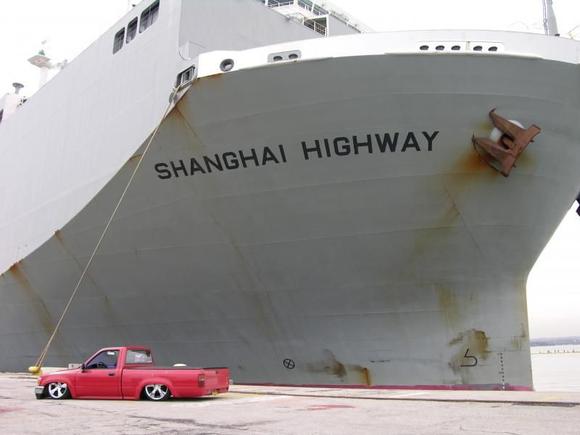 My truck in front of a car ship at work