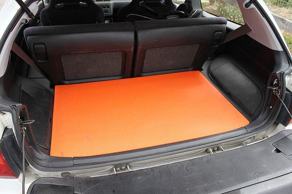 Rear interior w/orange mat, which keeps stuff from sliding around.