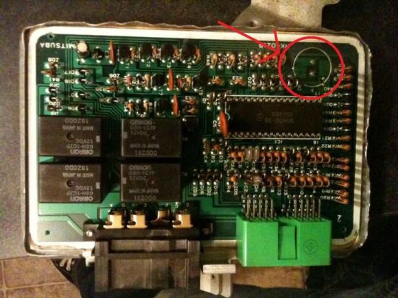 The red circle is where the small alarm sounder was.  I just pulled it off with a pair of needle-nose pliers.