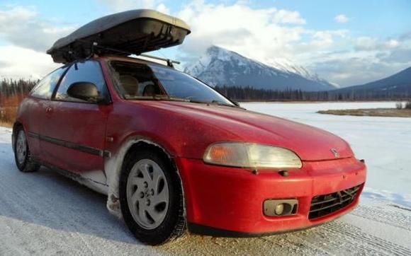 Parked in front of Mt. Rundle (Banff National Park) while on a road trip.