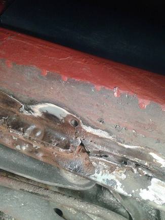 Used a metal brush to clean away some rust so i can s ee where to cut.