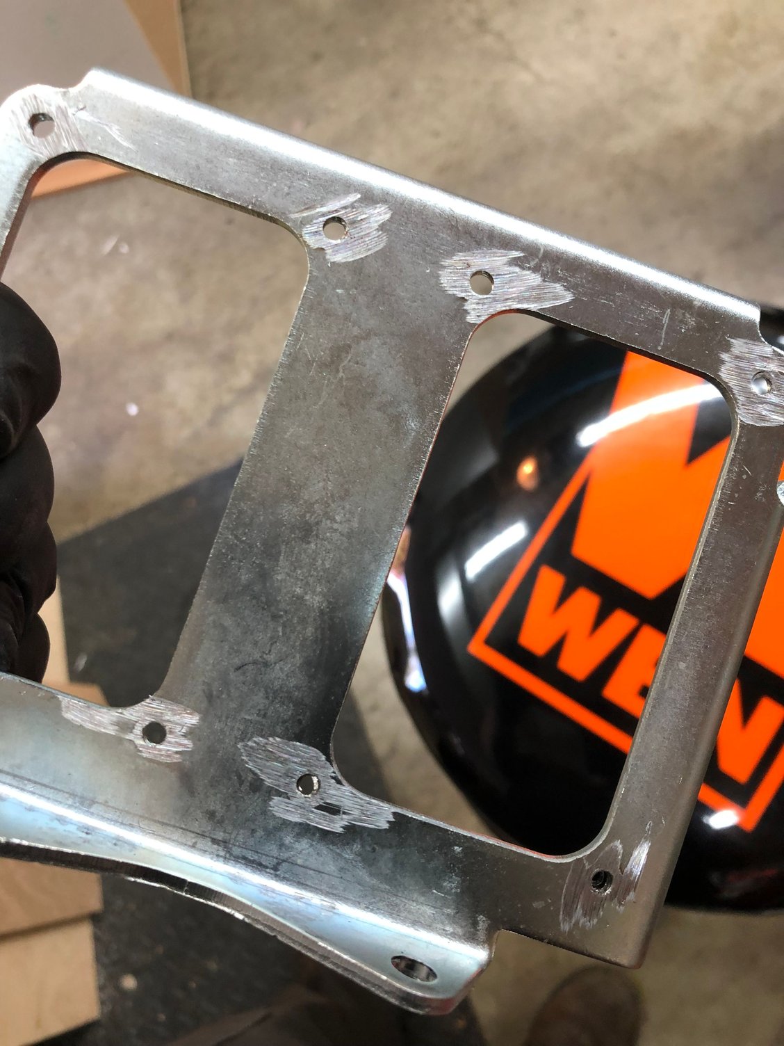 I ground off the nubs on the under side of the coil pack bracket since I turned it upside down.