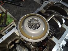 Oil pickup strainer is completely clogged. Glad I am pulling this thing apart. I noticed remnants of what looks like head gasket material. Hoping the internals are fine. Previous owner said it ran well and was quiet. Can't imagine the oil pressure was that great!