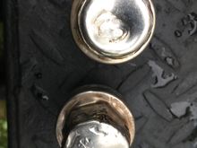 Here is mine.  Had to get a special round wrench to remove this. Lol