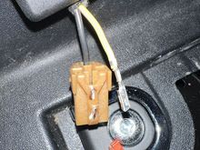 The purple yellow wire that is the hot for the 12V outlet