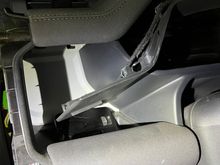 Black trim you pull down, once you’ve removed the side grab panel and extra screw holding in trim