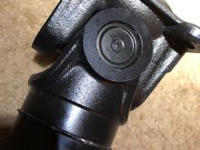 Note the thin weld and crimped in u-joint.