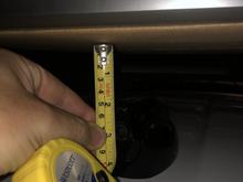 2" from top of shark fin to a piece of weighted cardboard sitting atop the roof-rack. 