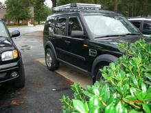 Surco Urban Roof Rack, WeatherTech Vent Deflectors, RoadKill.com's 1.30&quot; Wheel Spacer on rear, OEM Side Molding Trim.

2003 Toyota Tundra Access Cab V8 4WD Limited on the left was my project before the LR.  My 17 y.o. son got the truck.