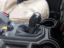 Put a Discovery 3 manual shift gaiter on it to avoid the plastic clatter when using the command shift