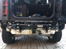 The 8 bolts that come with the Defender reused with the OEM recovery loops. 