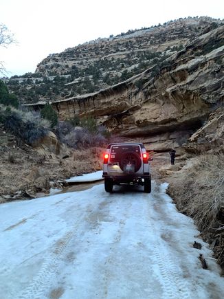 Driving over the frozen creek on the way to camp