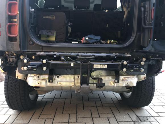 The 8 bolts that come with the Defender reused with the OEM recovery loops. 