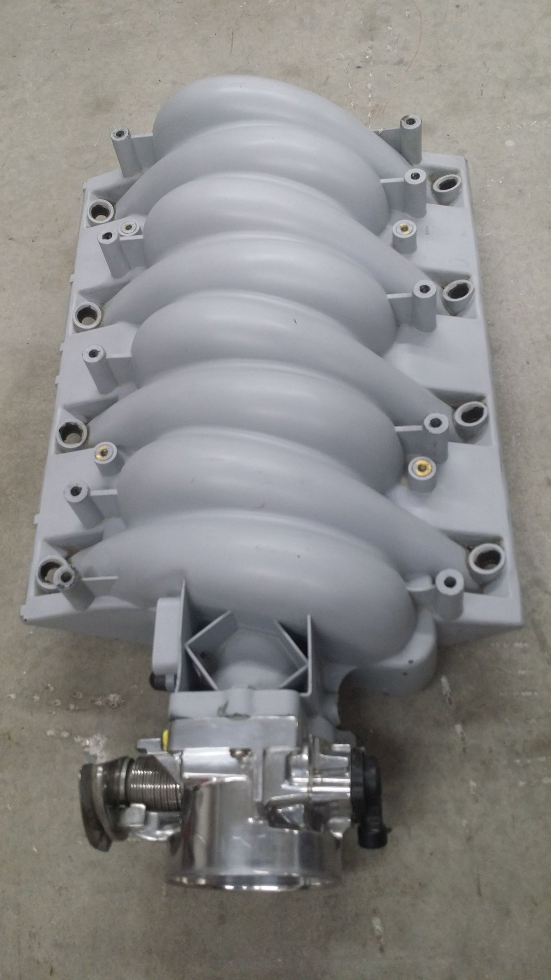 Sanded and primed ls6 intake with ported and polished throttle body