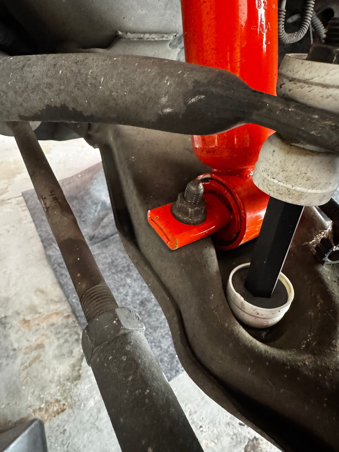 Front Driver Side (front of shock mount)