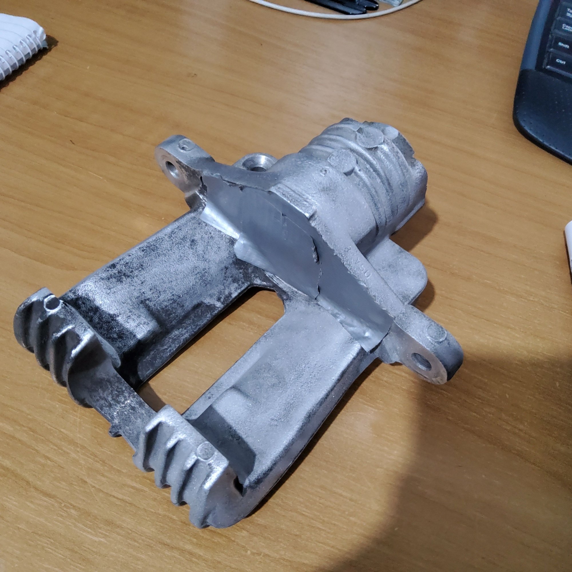 Soaked in Degreaser and scrubbed with a stiff brush. Then a wire wheel on the large areas and finally after a hot water wash - sand blast in my home cabinet half way though the sand blast. Its not aggressive like a commercial job..