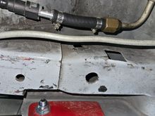 OEM fuel filter removed and fuel hose and fittings in place