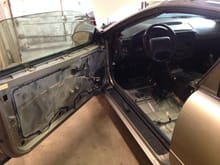Door panels removed and interior almost fully gutted.